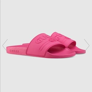 Pink GUCCI logo rubber slides